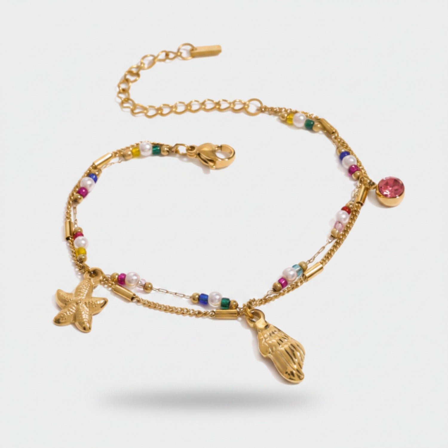 Gold Beaded Charm Bracelet With Sea Life Pendants
