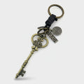 Vintage Brass Key Charm Keyring With Celestial Pendant