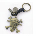 Skull And Crossbones Gold Metal Keychain Charm – novelty & toys (view 1)