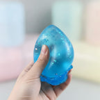 Glitter Water Drop Squishy - Blue - squeeze in hand