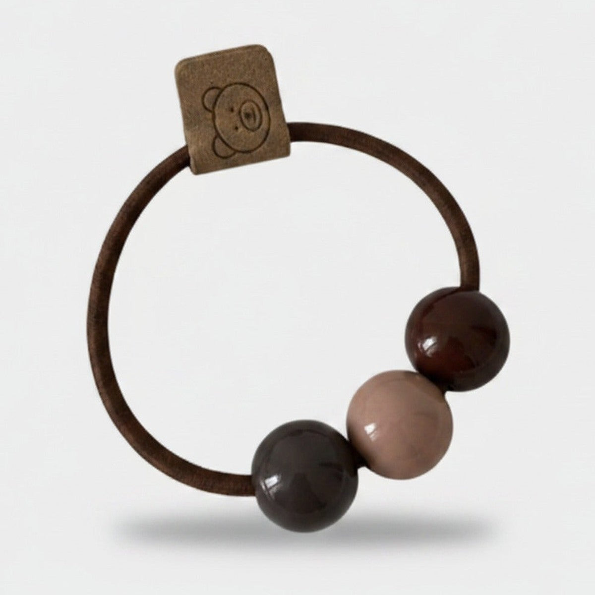 Brown Beaded Hair Tie with Charm Tag – hair accessories