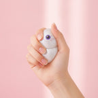 Spooky Dimple Squishy with Bamboo Steamer - Jack-O'-Lantern - squeeze in hand