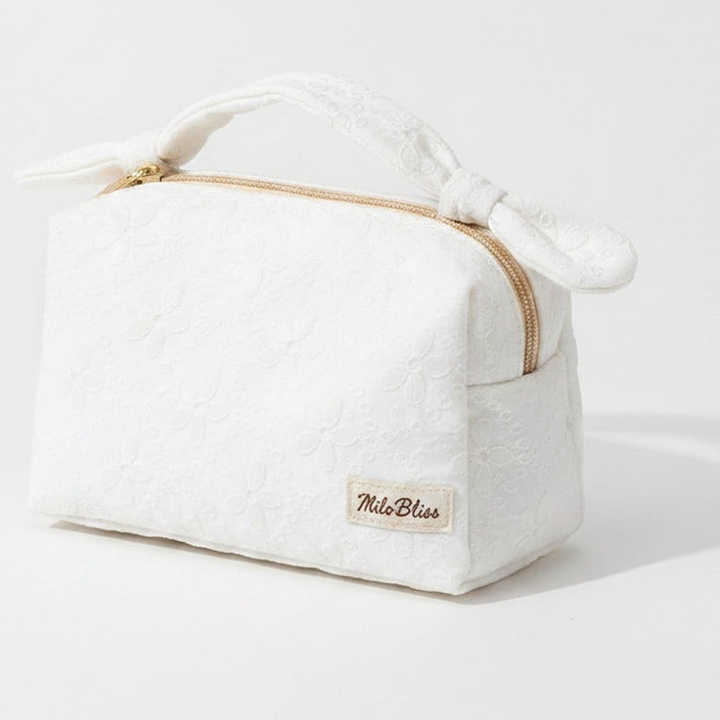 Quilted Cream Cosmetic Bag With Bow Handles – bags & wallets (view 1)