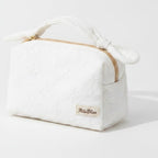 Quilted Cream Cosmetic Bag With Bow Handles – bags & wallets (view 1)