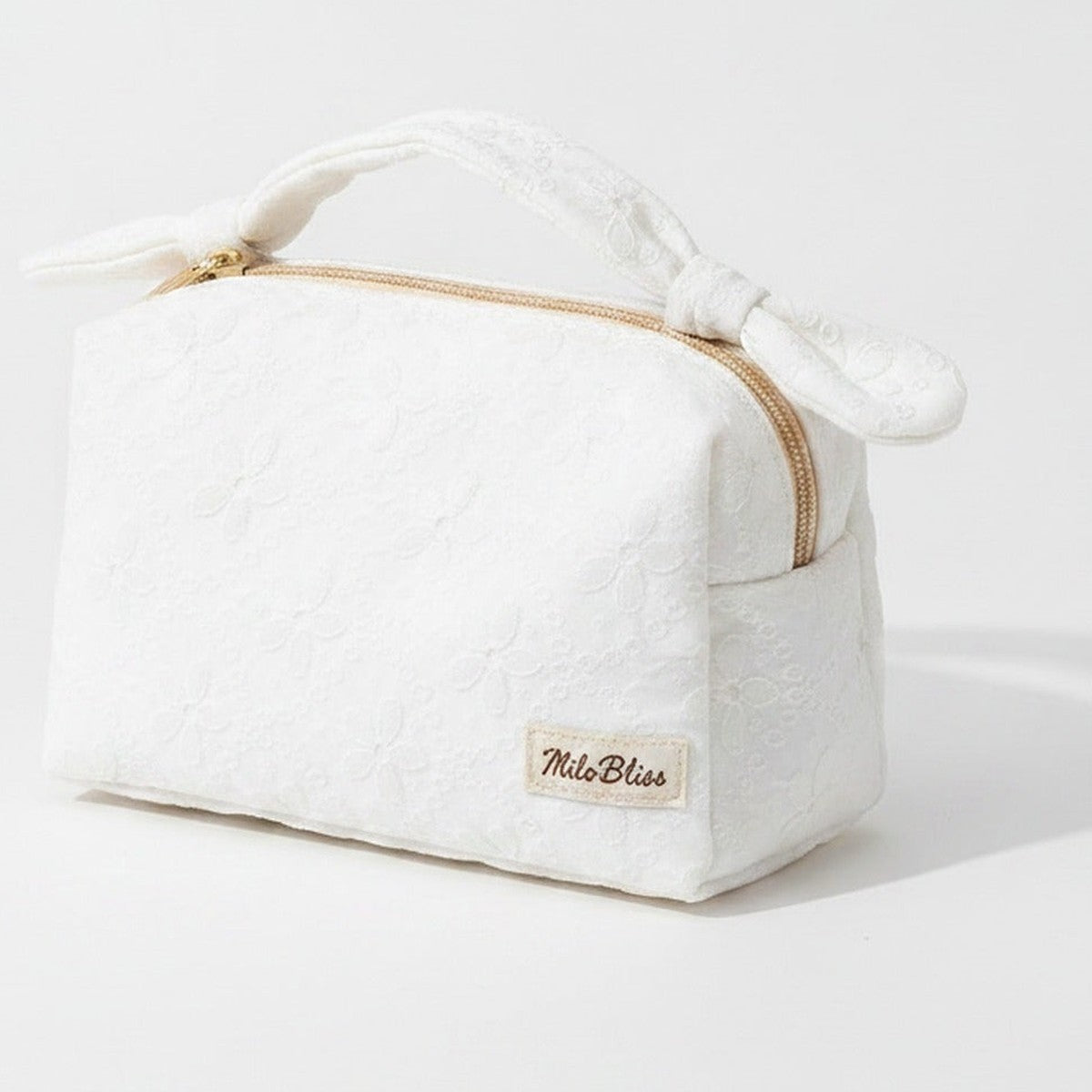 Quilted Cream Cosmetic Bag With Bow Handles – bags & wallets (view 1)