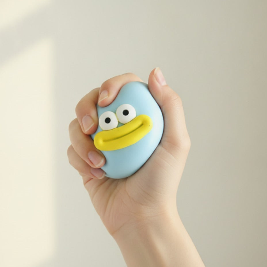 Duck Face Rubber Ball - Blue - squeeze in hand