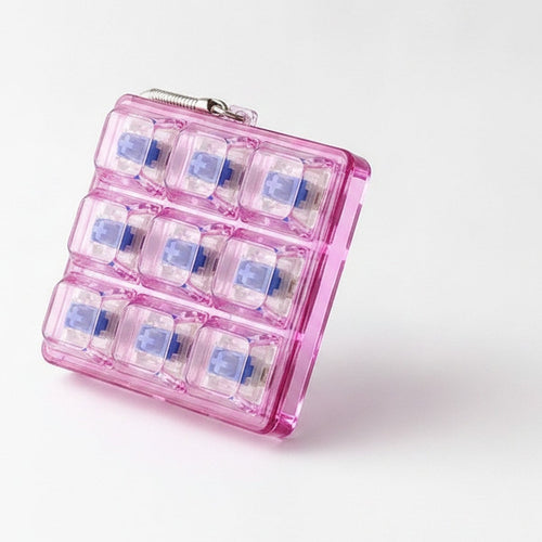 9 Key Fidget Switch Tester Keychain Toy - Pink