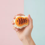 Squishy Pastry Charm - Taiyaki - squeeze in hand