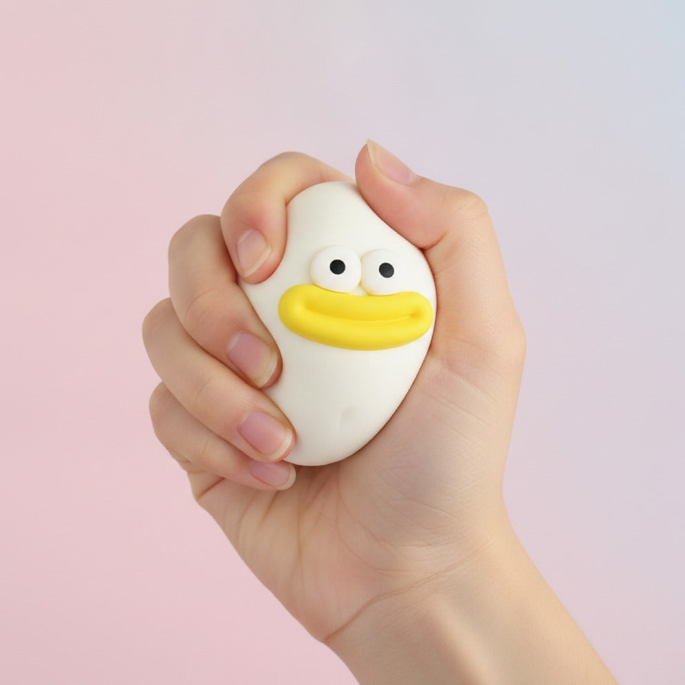 Duck Face Rubber Ball - White - squeeze in hand