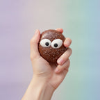 Cute Chocolate Sprinkle Googly Eye Treat - squeeze in hand