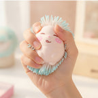 Pastel Pink Hedgehog Silicone Sensory Toy - squeeze in hand