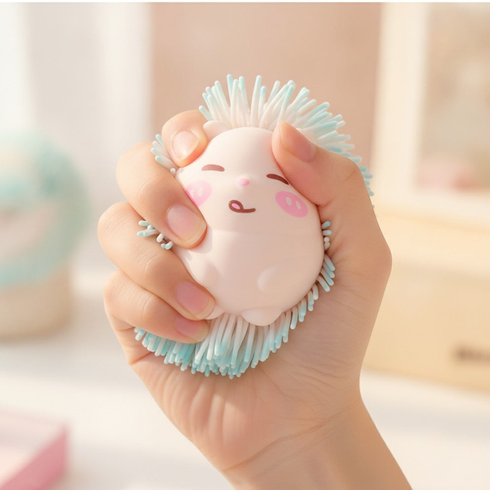 Pastel Pink Hedgehog Silicone Sensory Toy - squeeze in hand