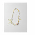 Yellow & White Star Beaded Charm With Bow – jewelry (view 1)