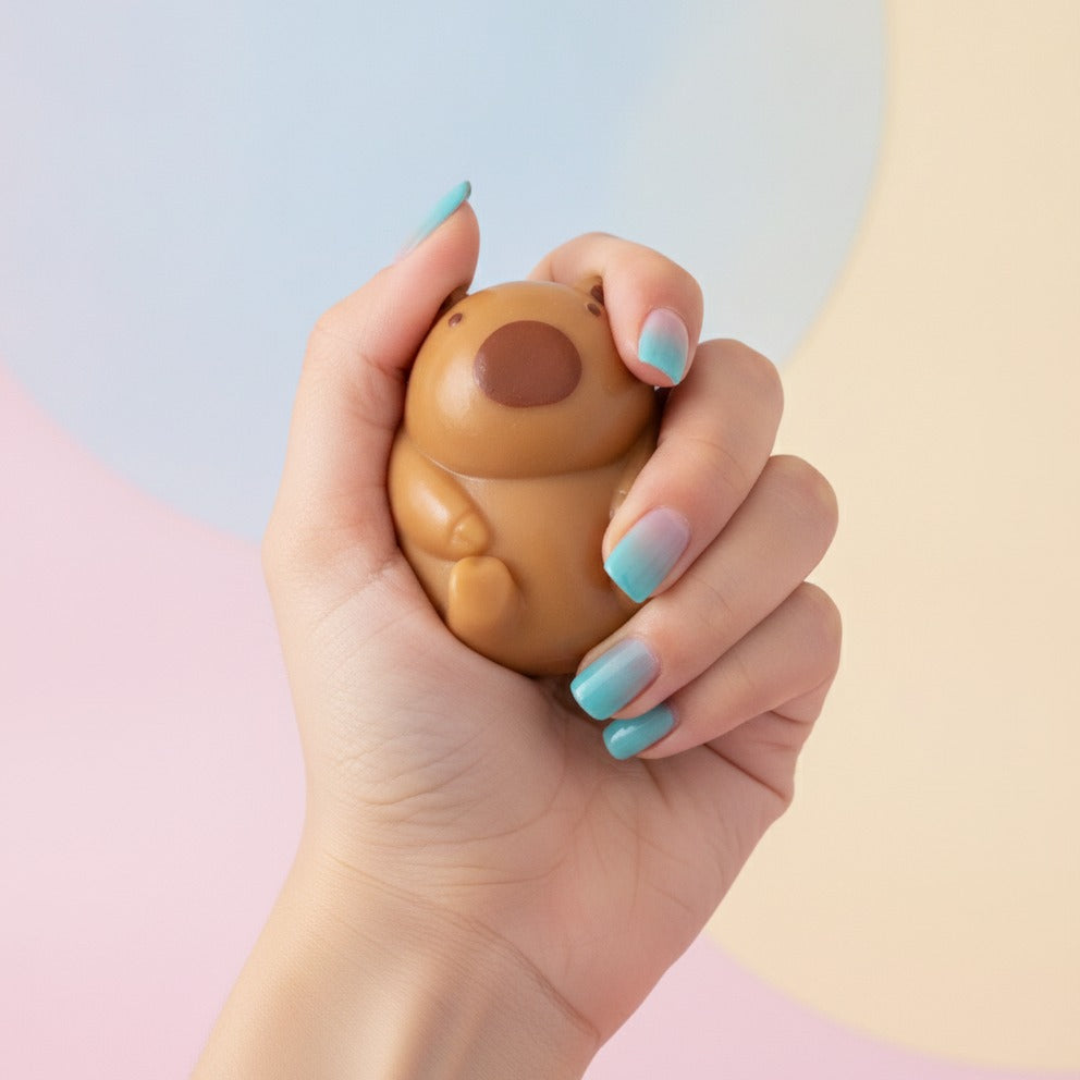 Cat Donut Hard Toy with Sprinkles - Capybara - squeeze in hand