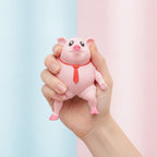 Chubby Pig Desk Stress Toy - squeeze in hand