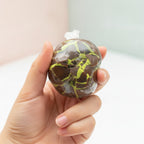 Crispy Bubble Squishy Ball - Crushed Ice Red - squeeze in hand