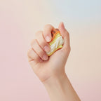 Dreamy Cake Squishy - Lavender Cake - squeeze in hand