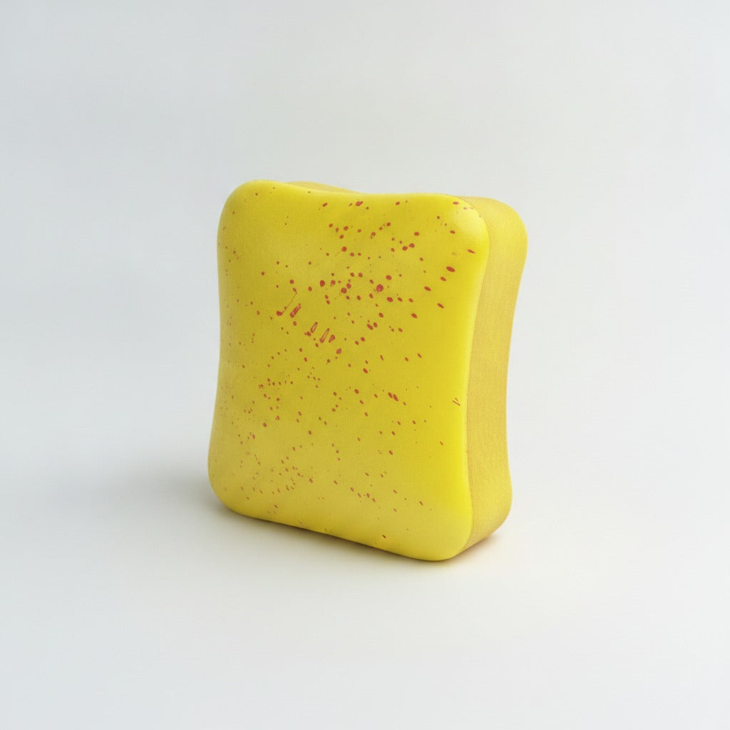 Butter toast squishy yellow with red speckles - front