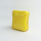 Butter toast squishy yellow with red speckles - front