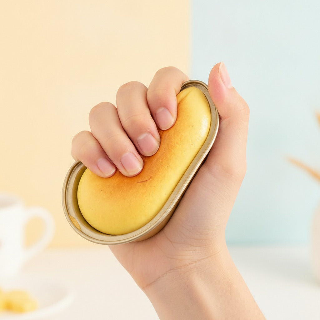 Half-Baked Cheese Squishy - Golden Cheese - squeeze in hand