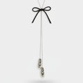 Silver Lariat Necklace With Black Bow – jewelry (view 1)