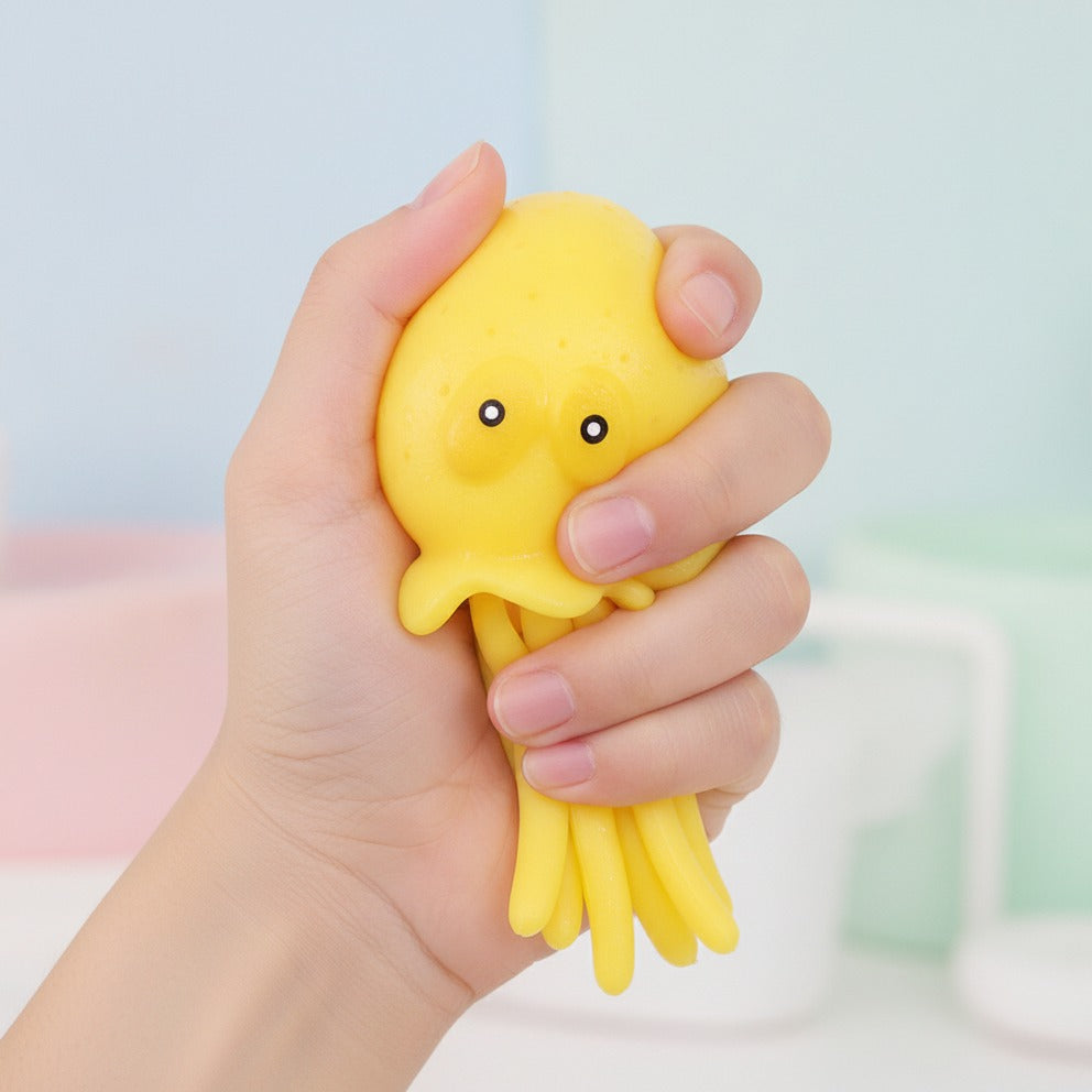 Yellow Jellyfish Squeeze Toy - squeeze in hand