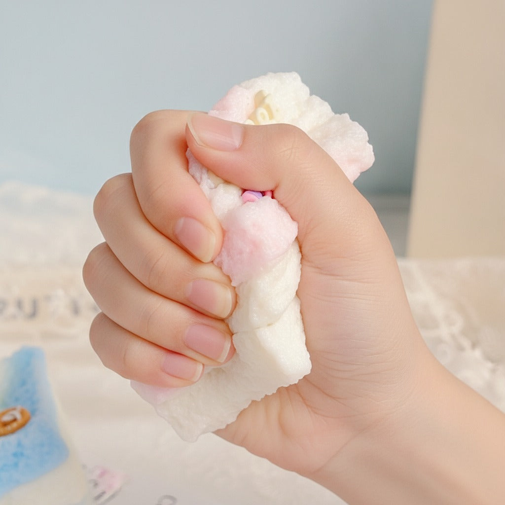 Fluffy Cake Slice Squishy - Blue - squeeze in hand
