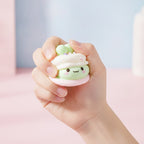 Squishy Cake Bite - Green - squeeze in hand