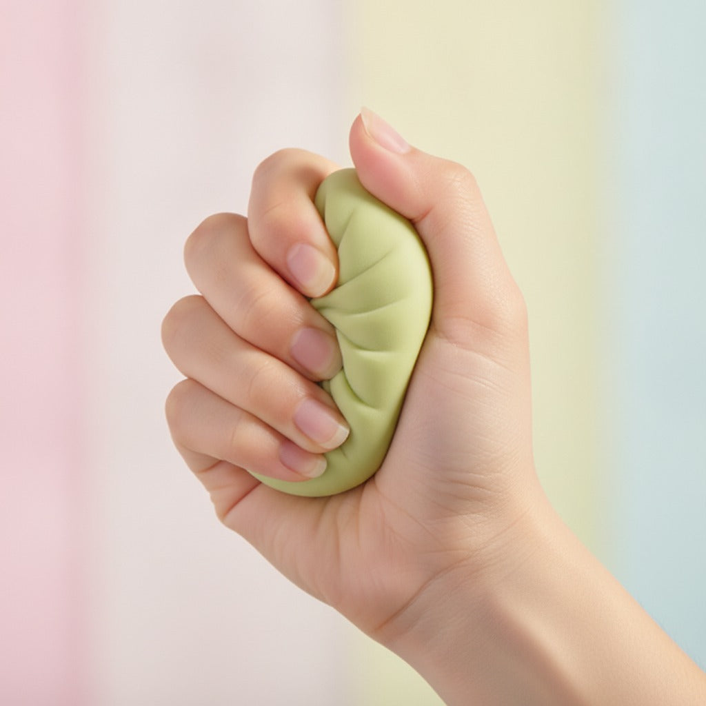 Pale Green Steamed Bun Soap in Basket - squeeze in hand