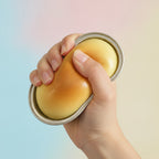 Half-Baked Cheese Squishy - Pink Cheese - squeeze in hand