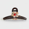 Tortoiseshell Hair Claw With Flower Charm – hair accessories (view 1)