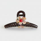 Tortoiseshell Hair Claw With Flower Charm – hair accessories (view 1)