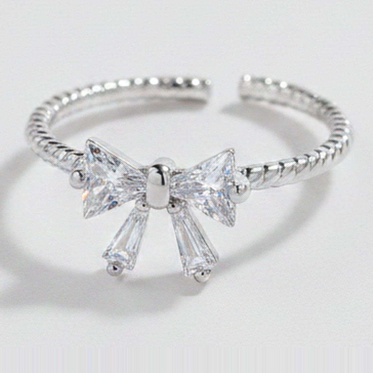 Silver Bow Ring With Cubic Zirconia Stones – jewelry (view 1)