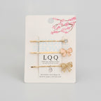 Cherry Blossom Gold Hair Clips Set With Bows – hair accessories (view 1)