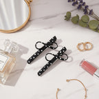 Black Polka Dot Bow Hair Clips Pair – hair accessories (view 2)