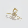 Gold Bow Pearl Hair Claw Clip – hair accessories (view 1)