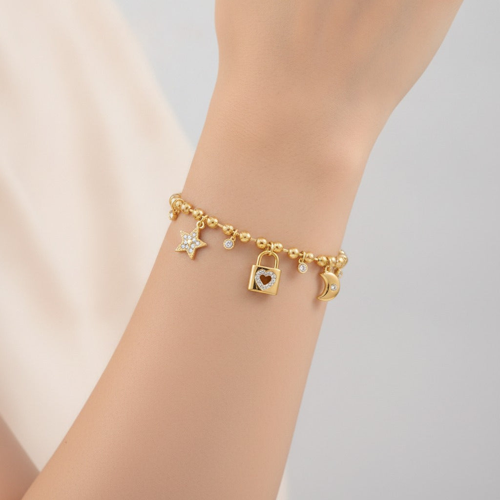 Dainty Gold Star Moon Lock Charm Bracelet – jewelry (view 3)