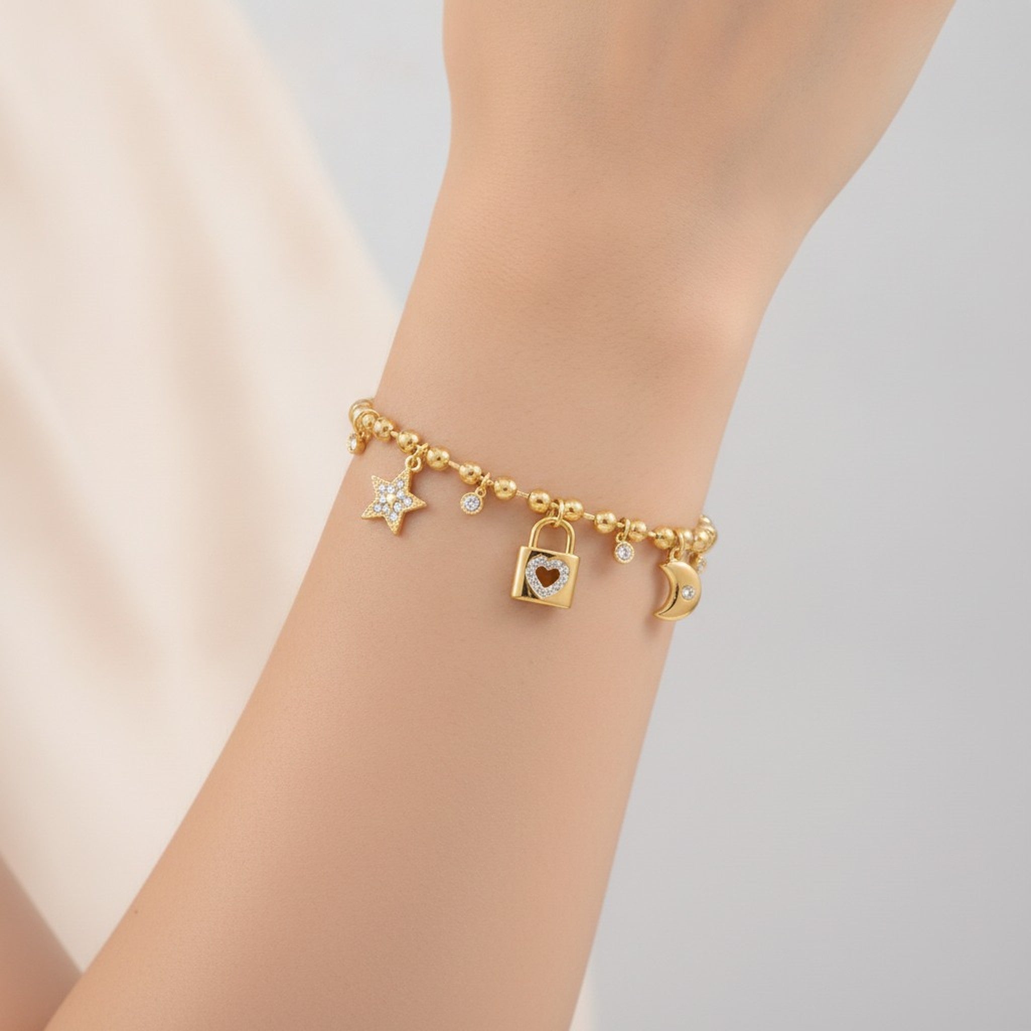 Dainty Gold Star Moon Lock Charm Bracelet – jewelry (view 3)
