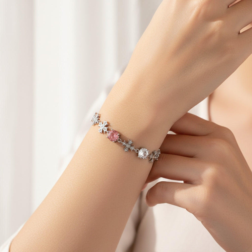 Silver Snowflake Charm Bracelet With Pink Crystals
