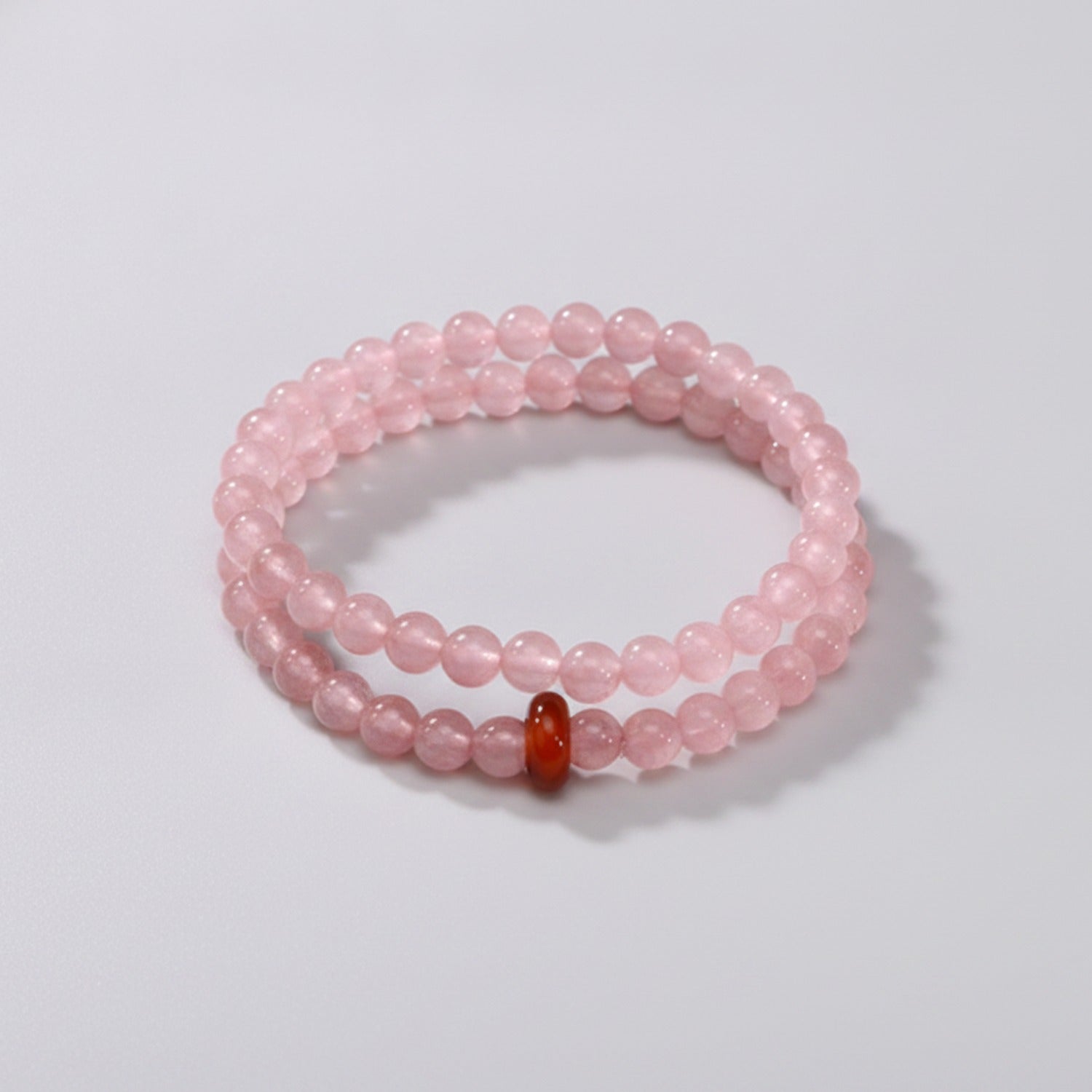 Rose Quartz Beaded Bracelet With Red Agate Accent