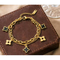 Four-Leaf Clover Charm Chain Bracelet - Double Layer Black Pearl Four Leaf Clover Bracelet Gold E126 – jewelry (view 1)