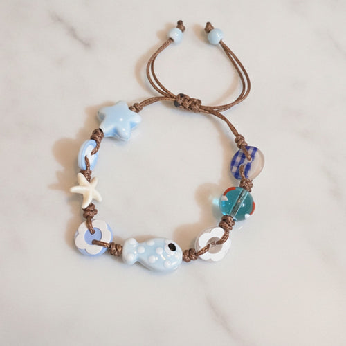 Blue Ceramic Charm Bracelet With Starfish Beads