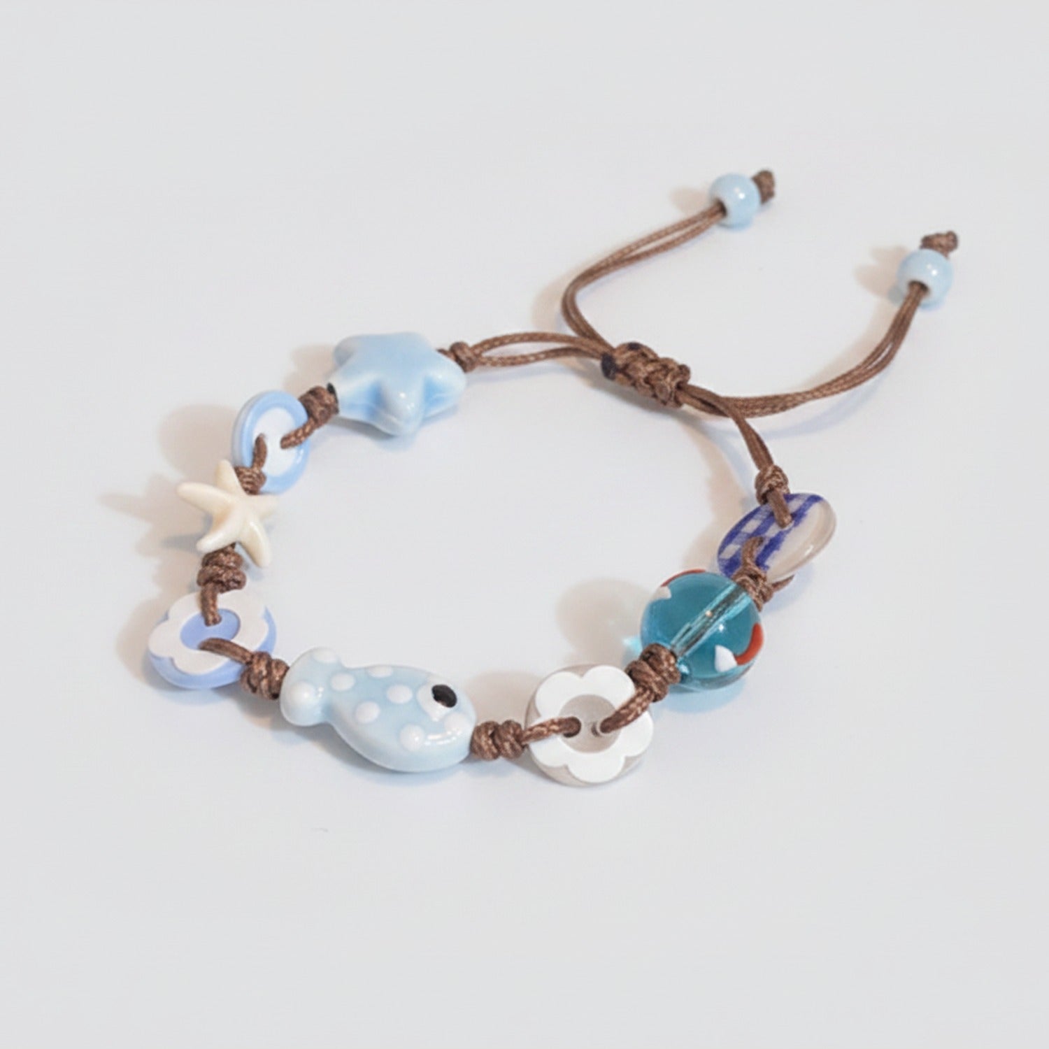 Blue Ceramic Charm Bracelet With Starfish Beads