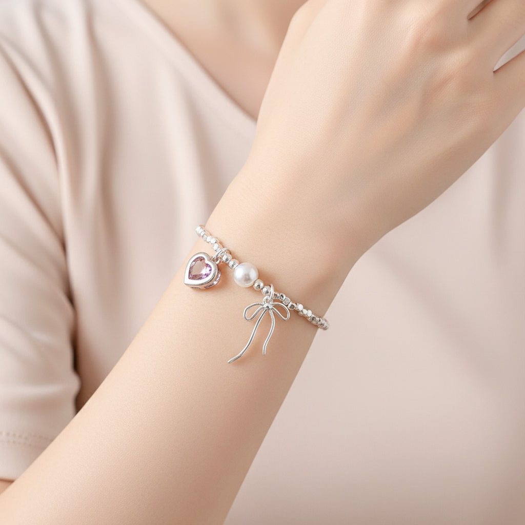 Silver Heart Charm Beaded Bracelet With Pearl And Bow