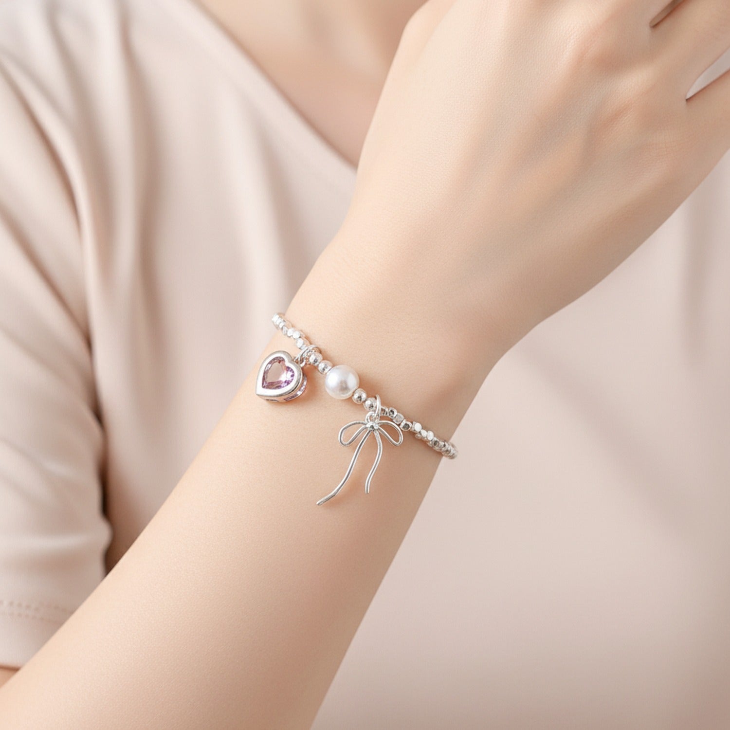 Silver Heart Charm Beaded Bracelet With Pearl And Bow