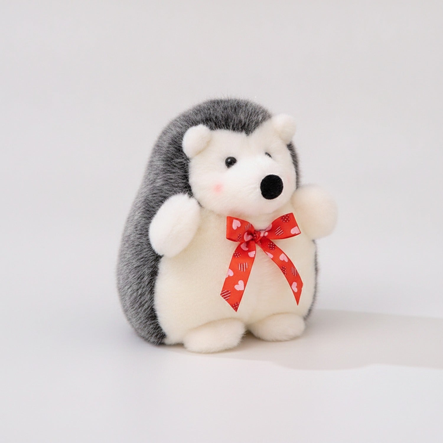 Adorable Gray and White Hedgehog Plush with Red Ribbon Bow – novelty & toys (view 1)