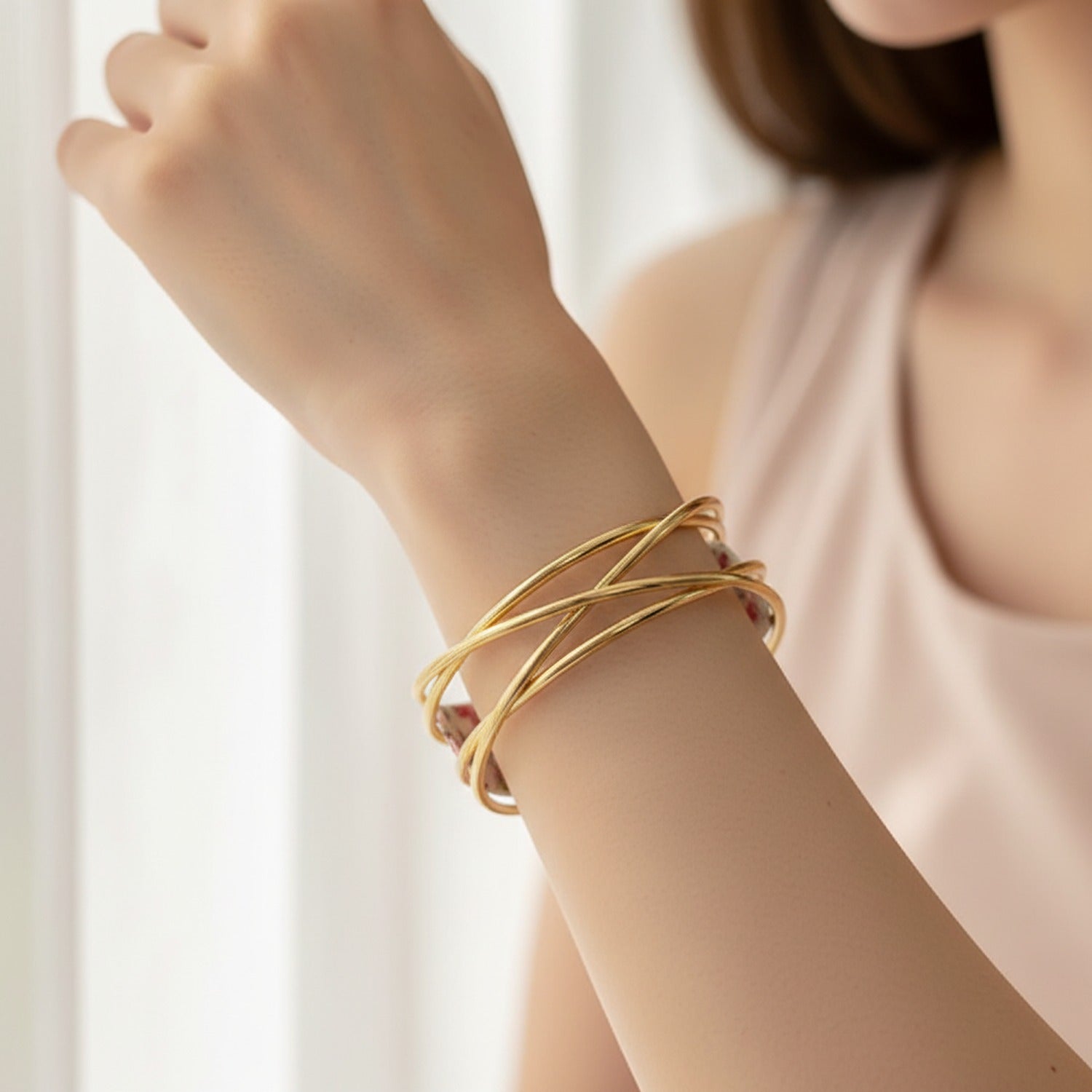 Gold Interlocking Cuff Bracelet With Oval Details