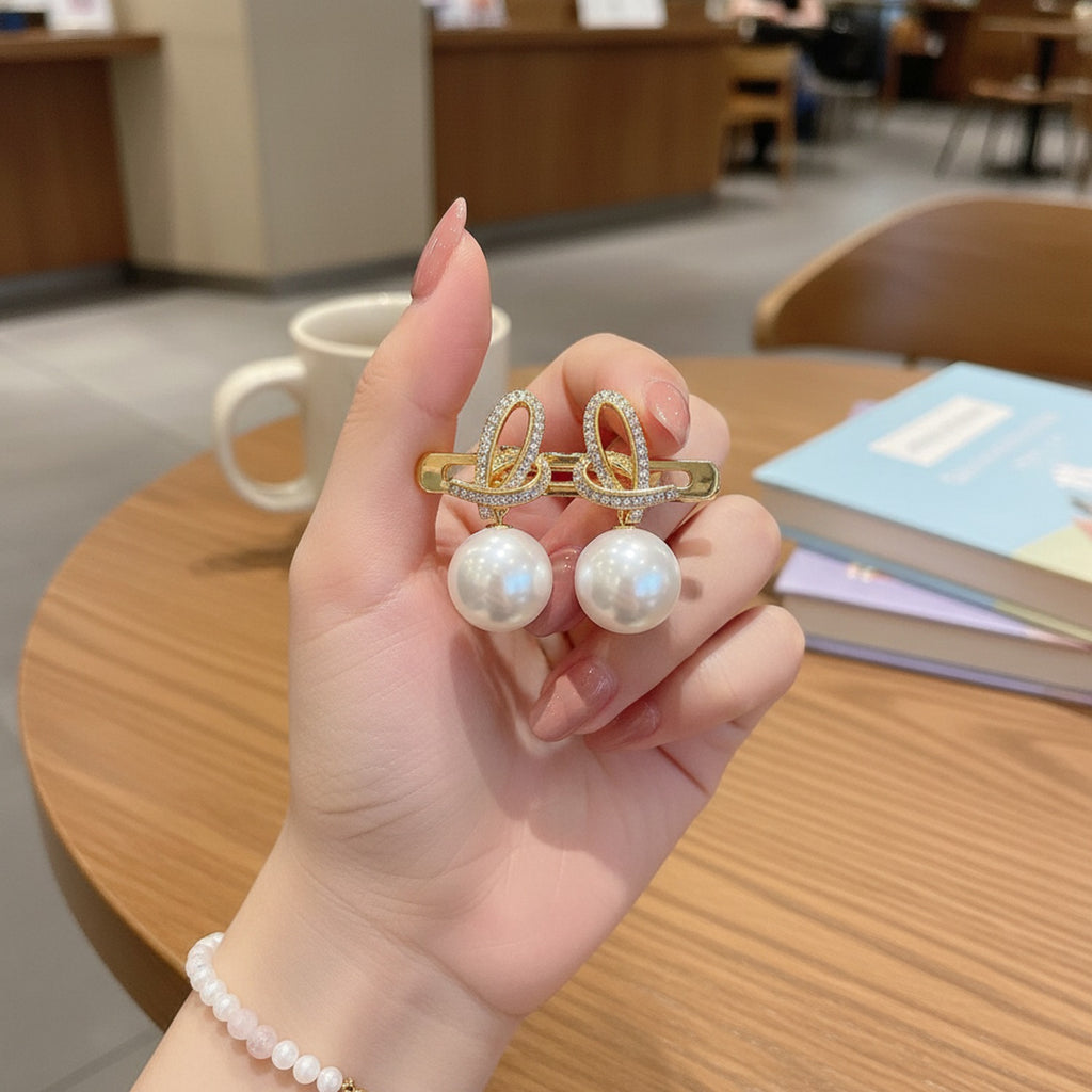 Pearl Drop Earrings With Rhinestone Bow Details
