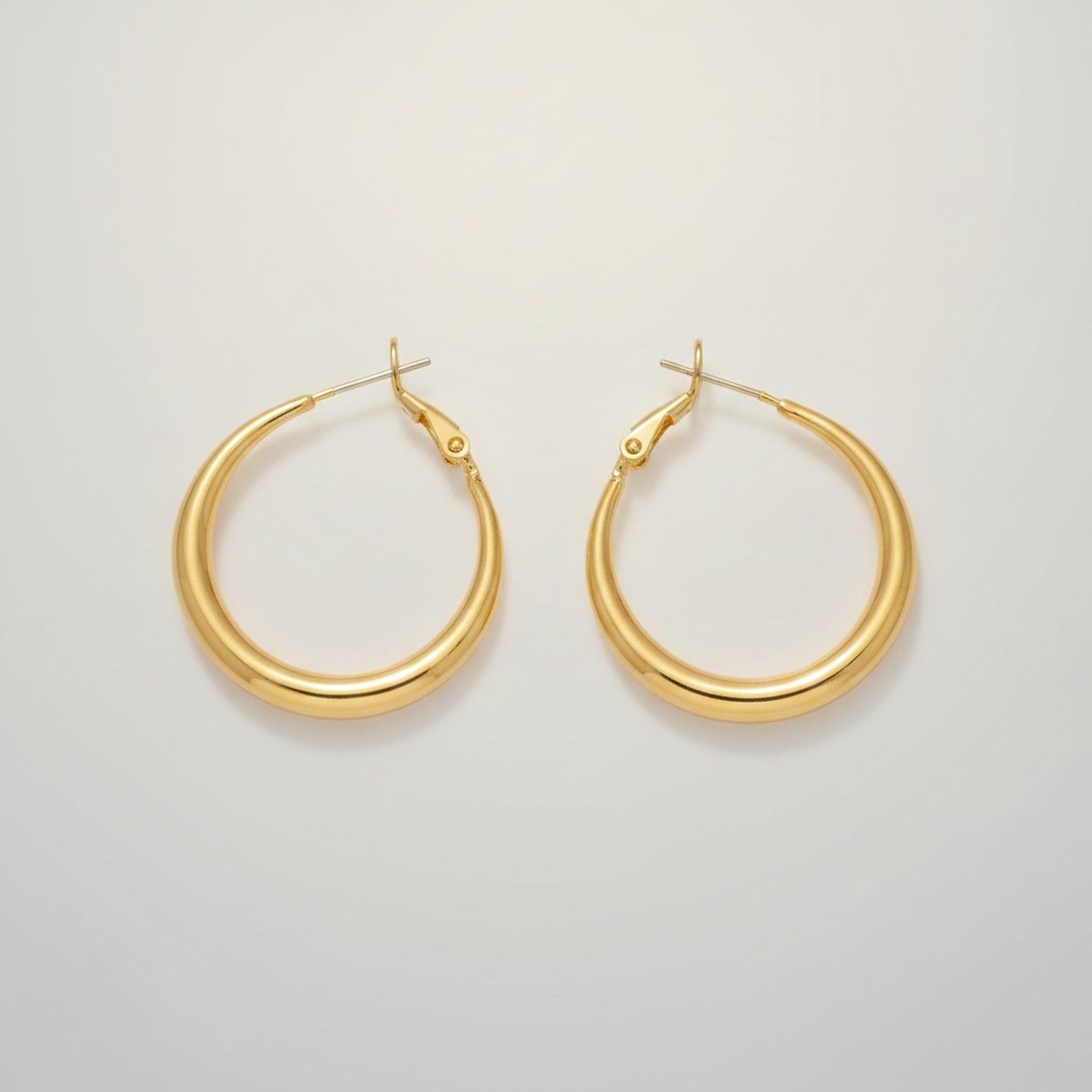 Sleek Gold Tone Hoop Earrings – jewelry (view 1)