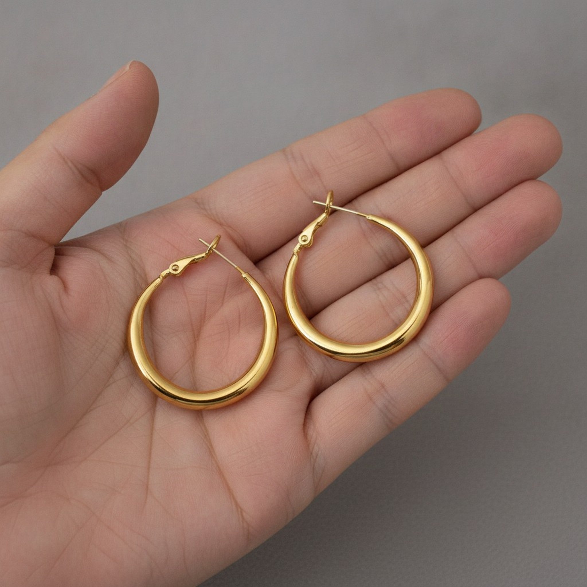 Sleek Gold Tone Hoop Earrings – jewelry (view 3)